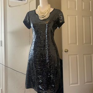 Black Midi dress, cap sleeve and sequined size L.
